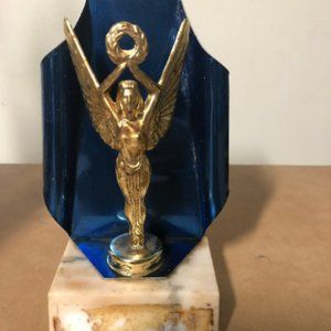 Women’s Trophy Metal White Granet Base Circa 1960s